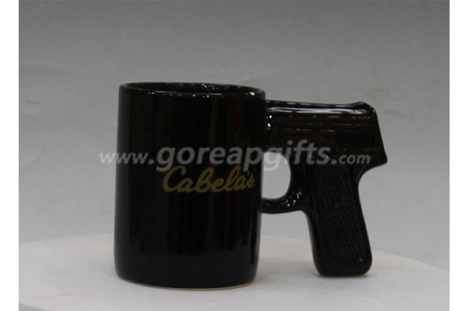 Ceramic mug with gun shape handle 